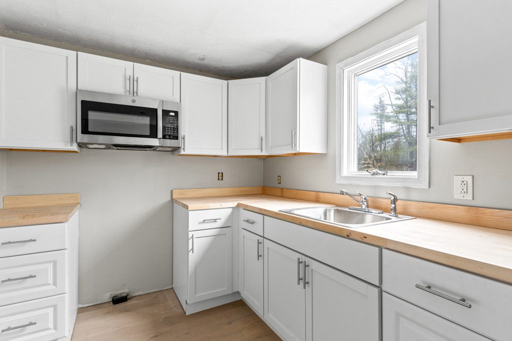 Kitchen with white cabinets